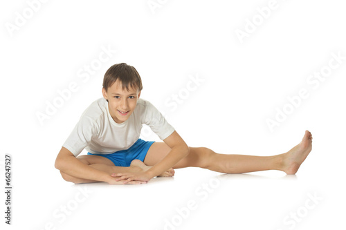 Teenage boy exercising yoga