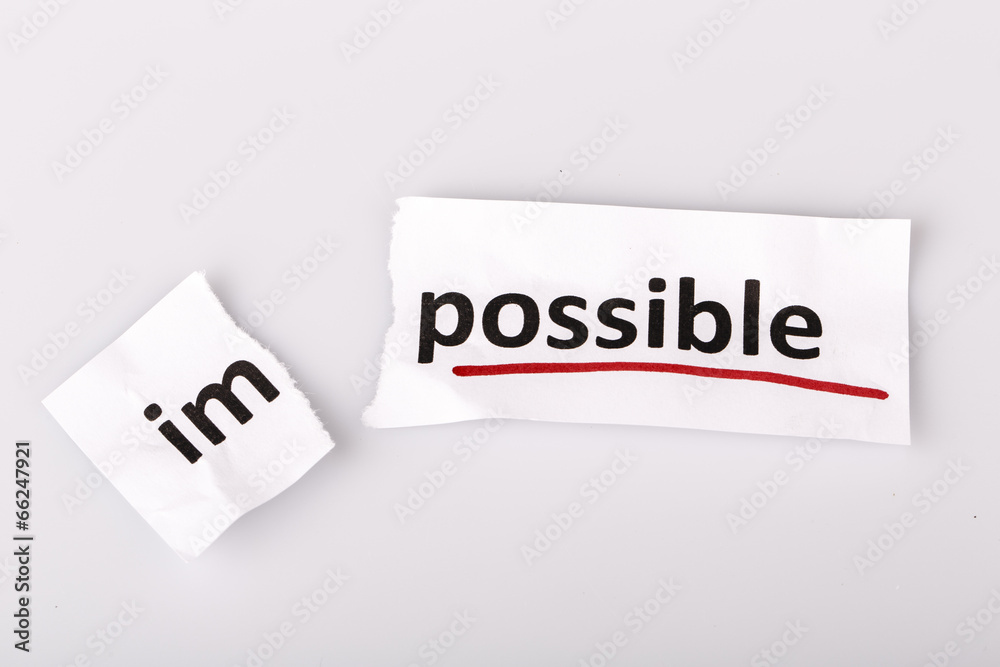 The word impossible changed to possible on torn paper