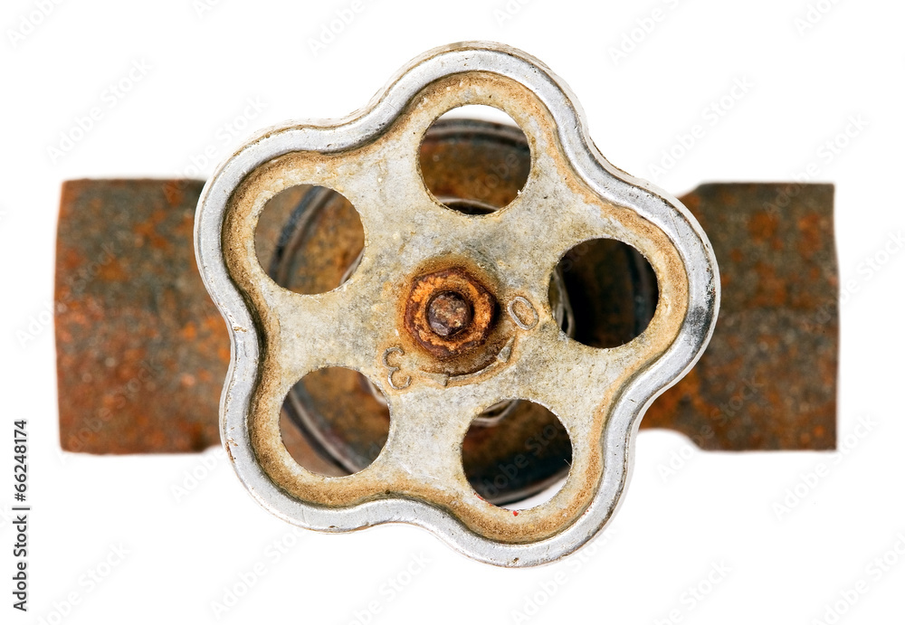 Old rusty brown pipe with crane