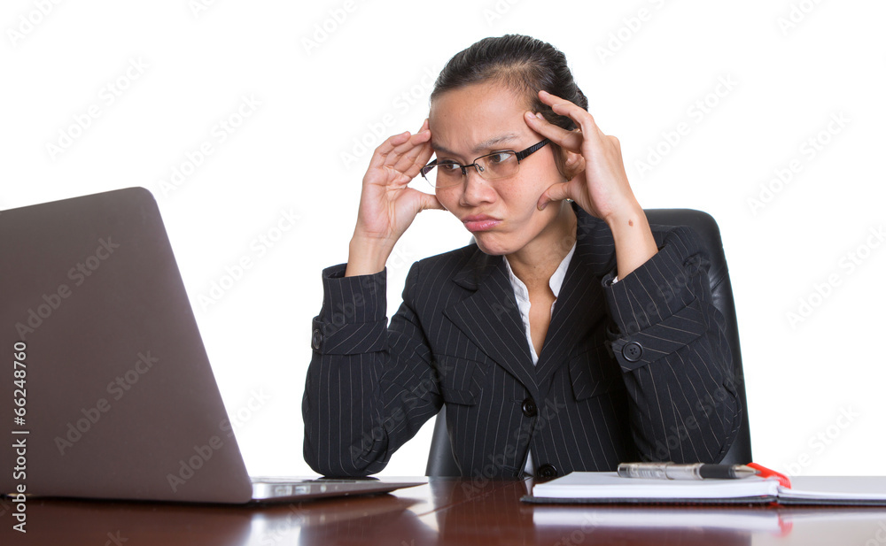 Asian businesswoman at her office desk over white backfground Asian businesswoman at her office desk over white backfground