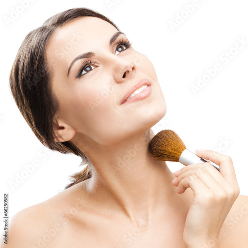 Smiling woman with make up brush, isolated