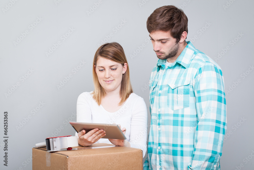 Couple calling transport company to move in new house
