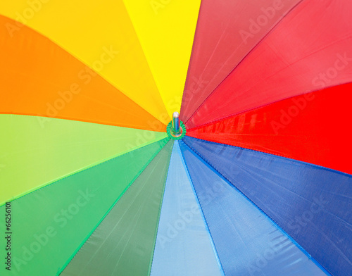 Close-up view of colorful umbrella.