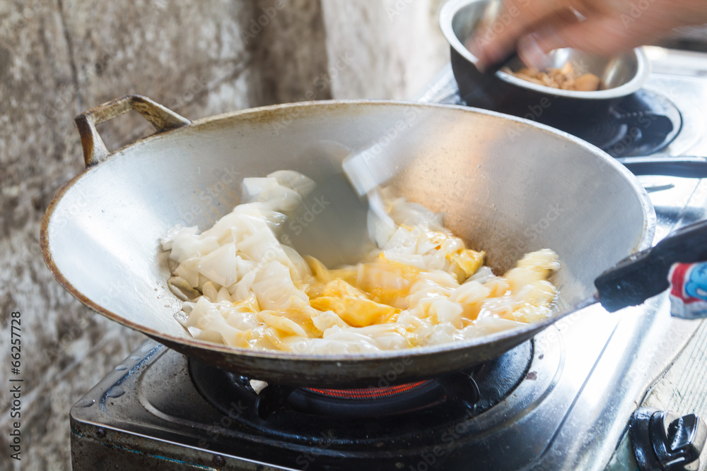 Cooking asian stir-fried noodles Cooking asian stir-fried noodles