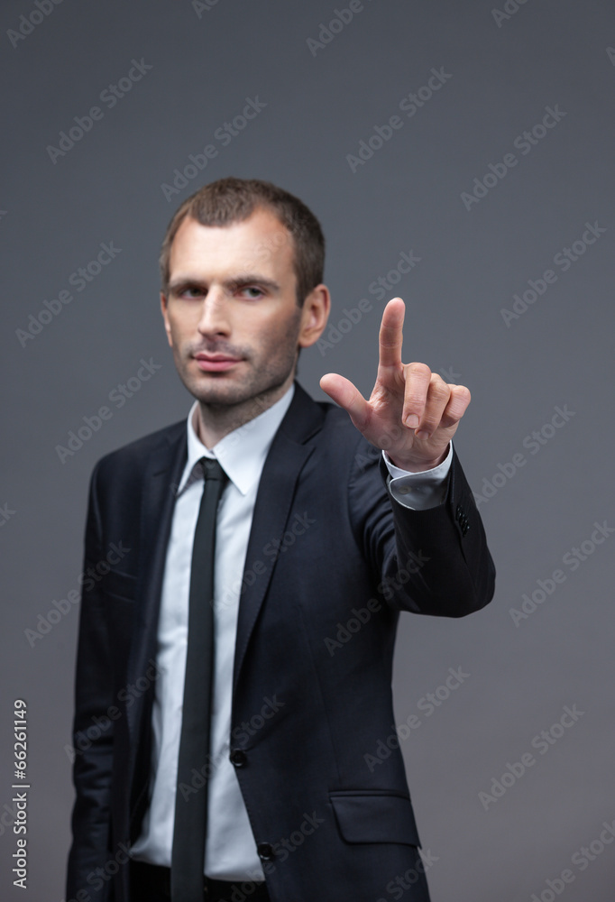 Portrait of executive pointing hand gestures, isolated Portrait of executive pointing hand gestures, isolated