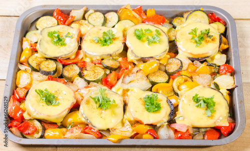 Baked mushrooms with cheese and parsley with vegetables