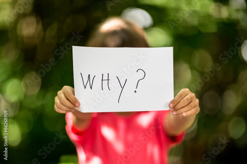 Girl with Why sign