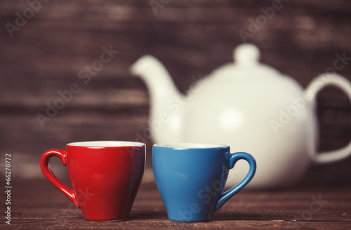 Teapot and two cup of tea.