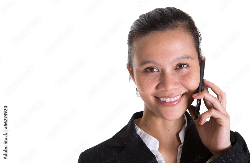 Asian businesswoman with a smart phone over white background Asian businesswoman with a smart phone over white background