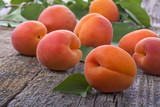 Healthy organic apricots on old rustic table