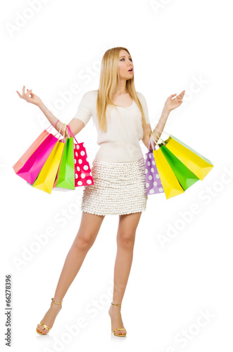 Woman with shopping bags isolated on white