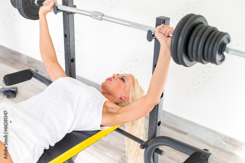 Fitness with young, blond woman