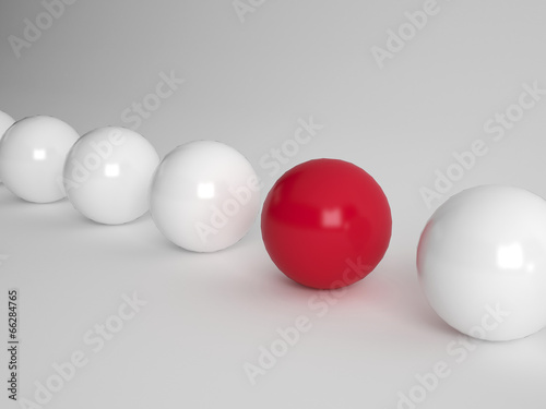 Several white ballls and one red photo