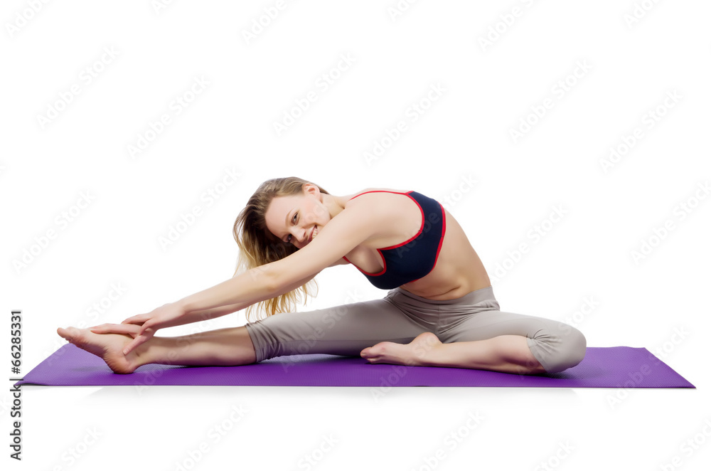 Young female doing exercises on white Young female doing exercises on white