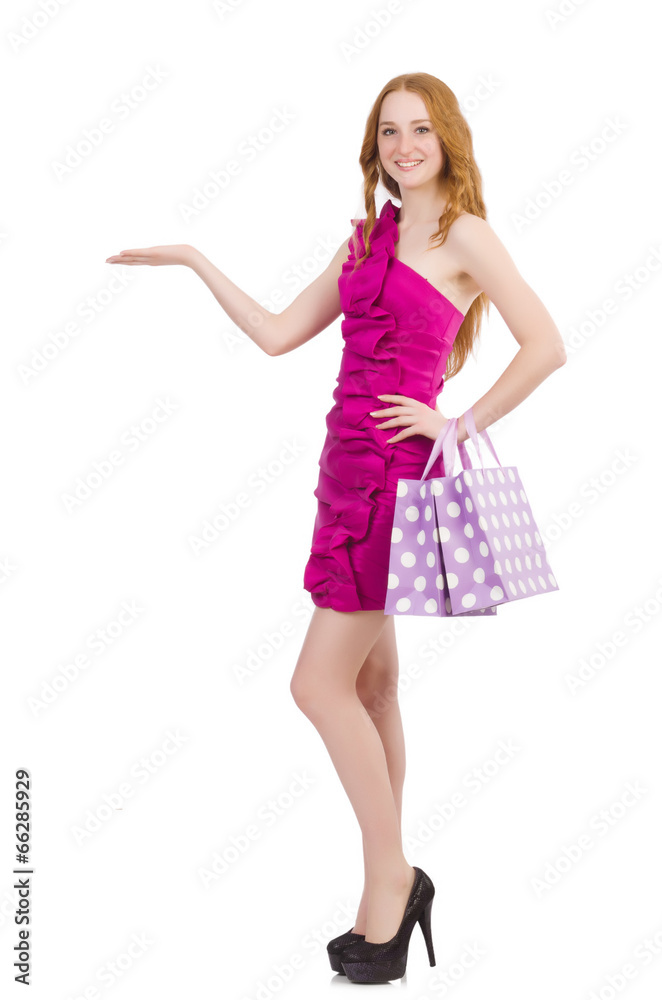 Woman with shopping bags isolated on white Woman with shopping bags isolated on white