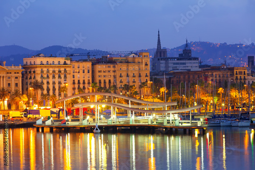 Port Vell and Barcelona cityspace in dawn