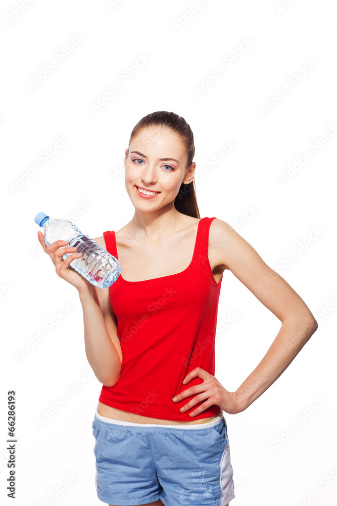 happy sporty woman with bottle of water. isolated on white happy sporty woman with bottle of water. isolated on white