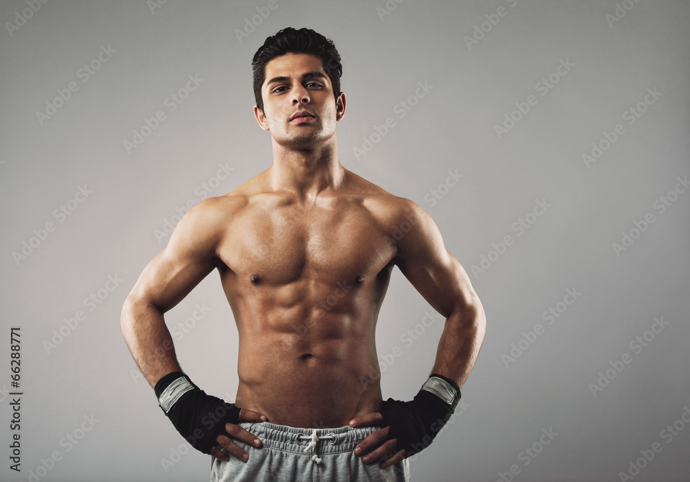 Muscular young bodybuilder with an attitude