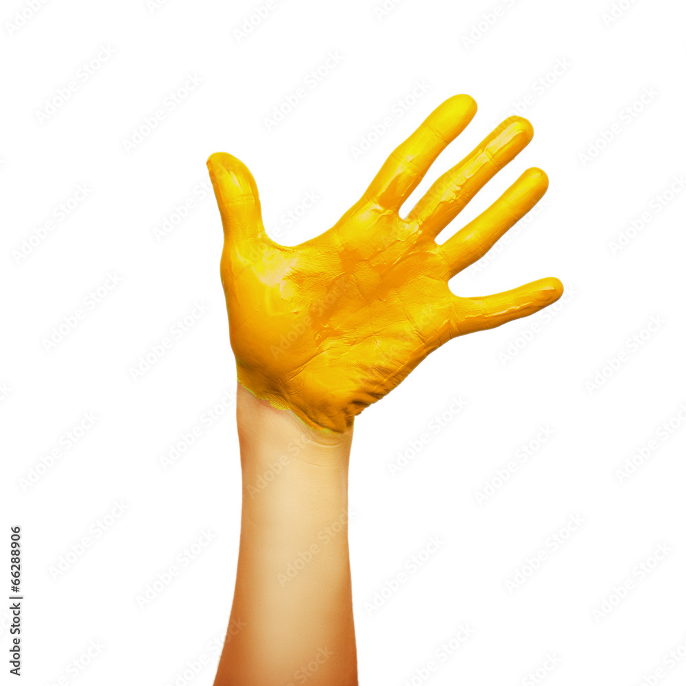Obraz premium hand in yellow paint
