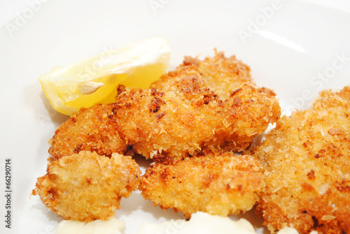 Crispy Fried Catfish Served with a Lemon Wedge