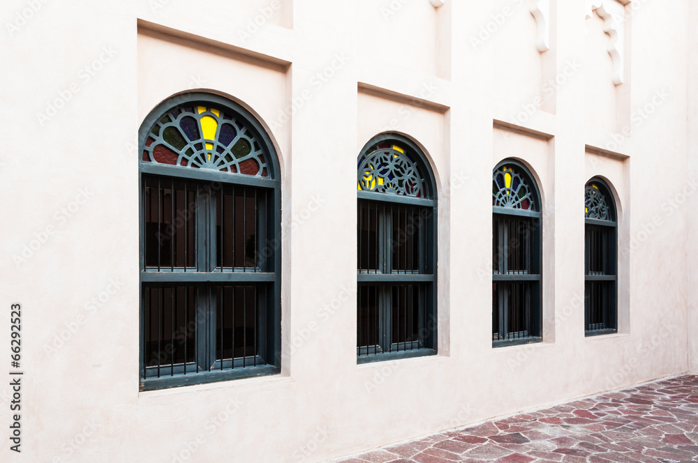 Row of arabian artistic windows in Doha, Qatar