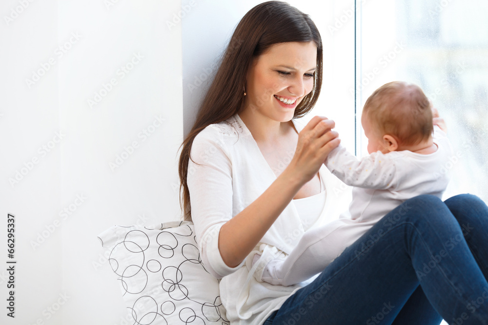 Mother and Baby playing. Happy Family Mother and Baby playing. Happy Family