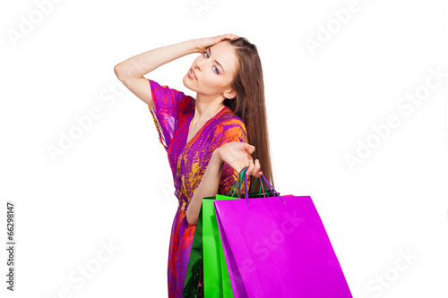 beautiful woman with shopping bags, isolated over white