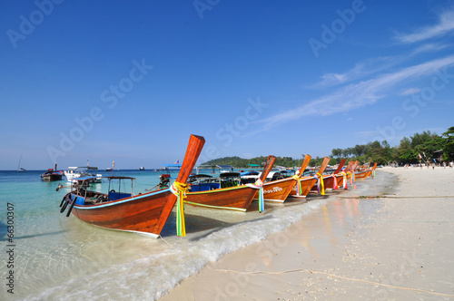 The boat on white sand beach of Lipe island, Thailand