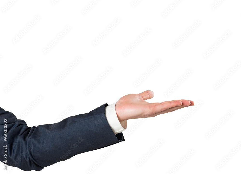 Businessman holding hand out in presentation Businessman holding hand out in presentation