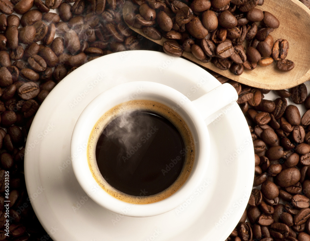Fototapeta premium cup of coffee with cofee beans