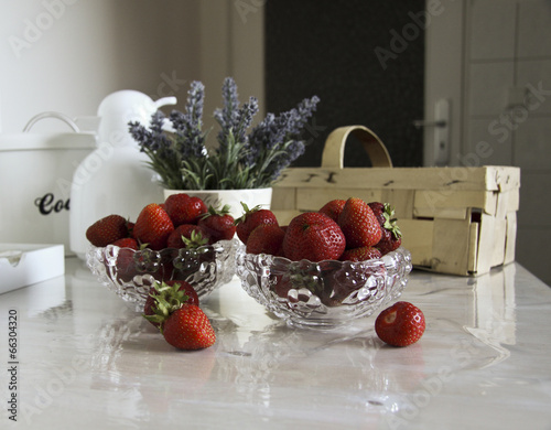 still life with strawberries and flowers photo