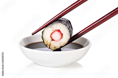 Hosomaki sushi with chop sticks and soy sauce