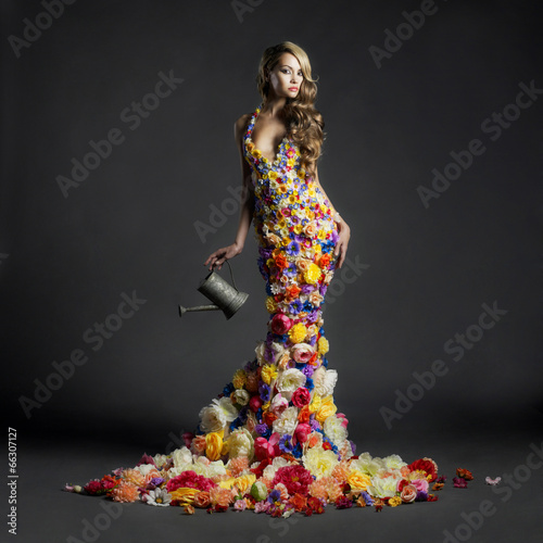 Gorgeous lady in dress of flowers