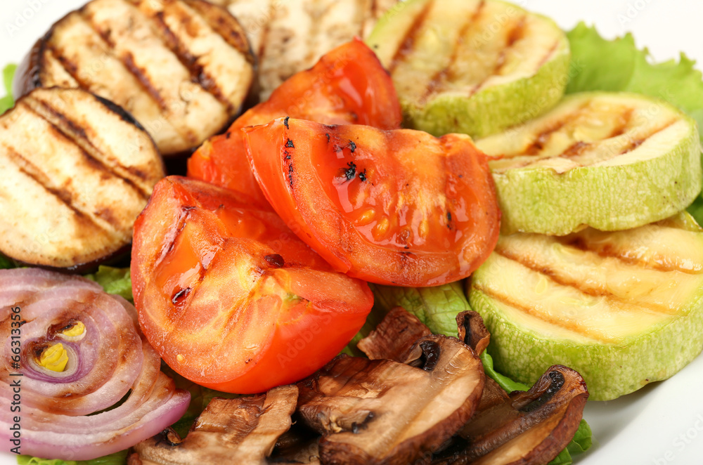 Delicious grilled vegetables on plate close-up Delicious grilled vegetables on plate close-up