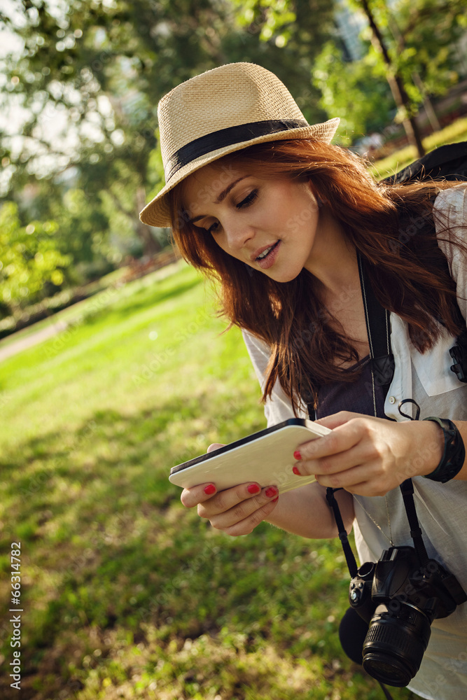 Young Tourist Girl Using Digital Tablet