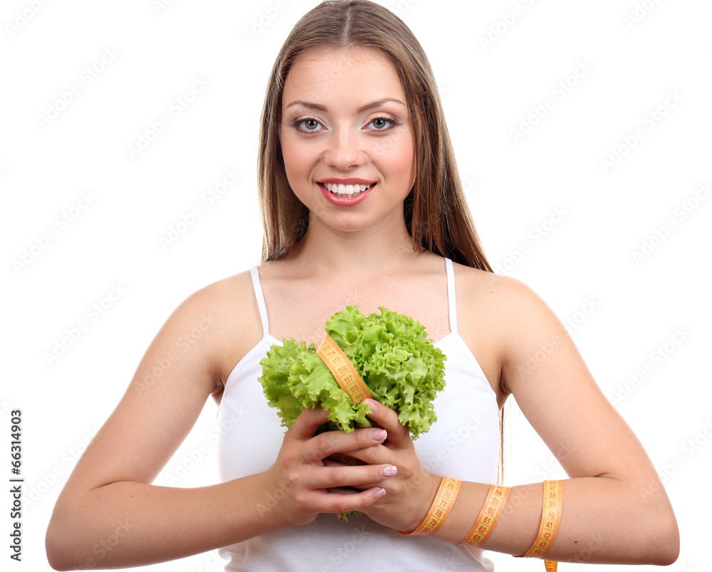 Beautiful girl with lettuce and measuring tape, isolated Beautiful girl with lettuce and measuring tape, isolated