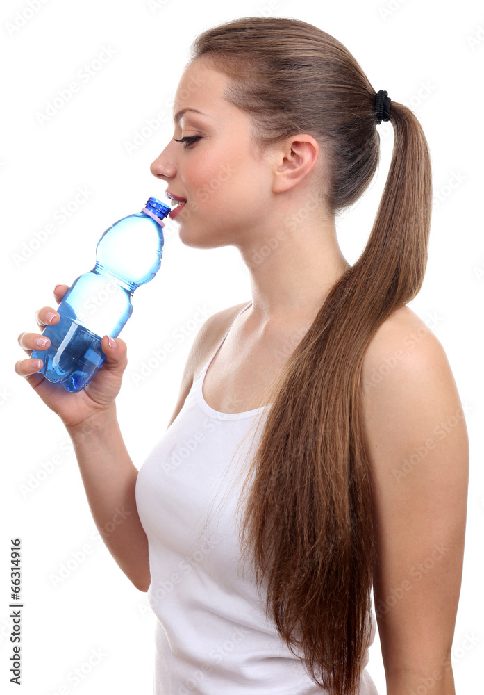 Beautiful girl drinks water, isolated on white Beautiful girl drinks water, isolated on white