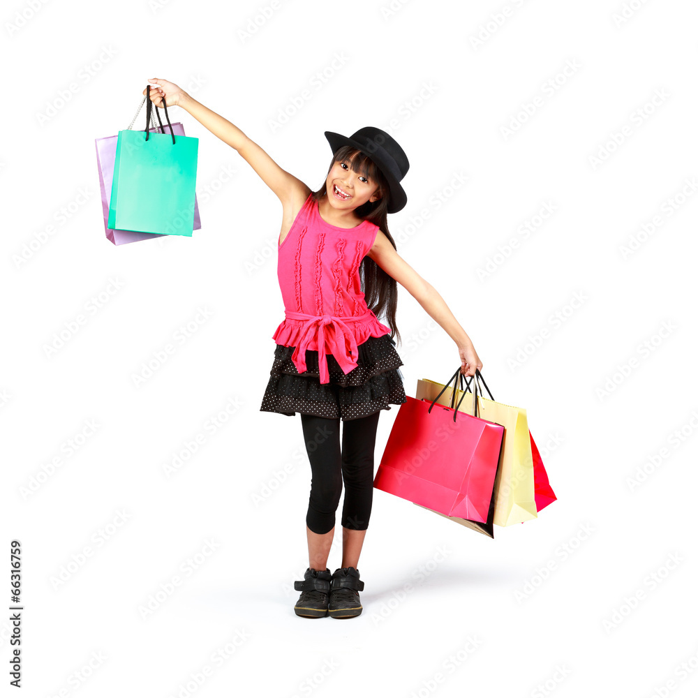 Little asian girl with shopping bags
