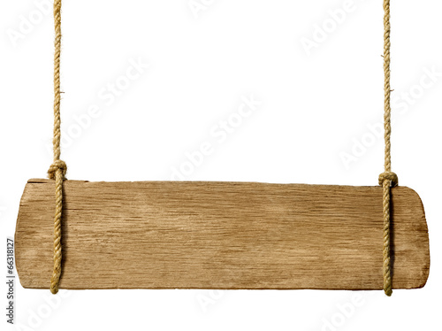 Wooden sign hanging from ropes photo