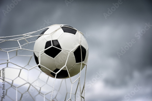 Soccer ball in goal © byrdyak