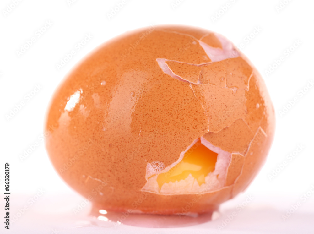 Broken egg isolated on white