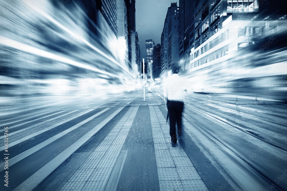 Naklejka premium traffic with blur light through city at night