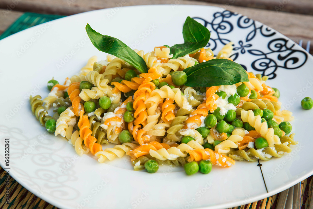 Italian pasta with ricotta cheese,olive oil, and fresh green pea Italian pasta with ricotta cheese,olive oil, and fresh green pea