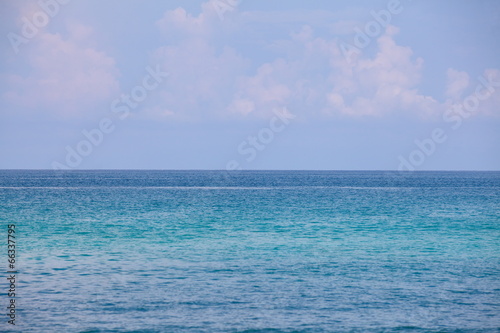 Blue sea water and blue sky background