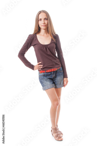 Beautiful woman in shorts, isolated on white