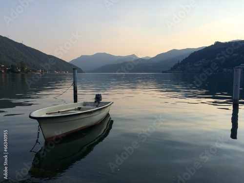 Lonely boat on Lake Lugano