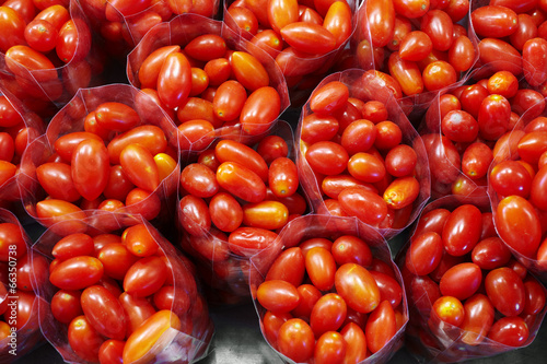 close up many cherry tomato in plastic bag © seksanwangjaisuk