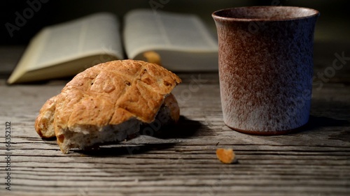 bible with chalice and bread, panning,sliding, tilt