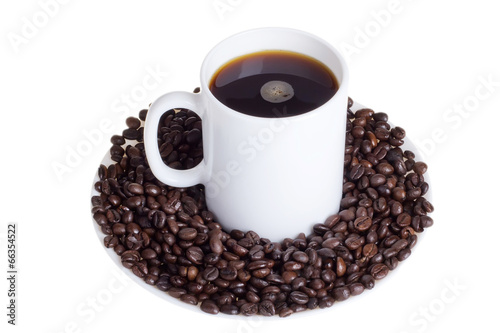 Coffee beans with a cup of coffee