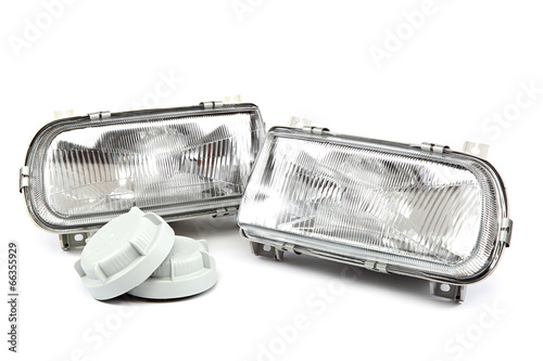 Car headlights isolated on a white background.